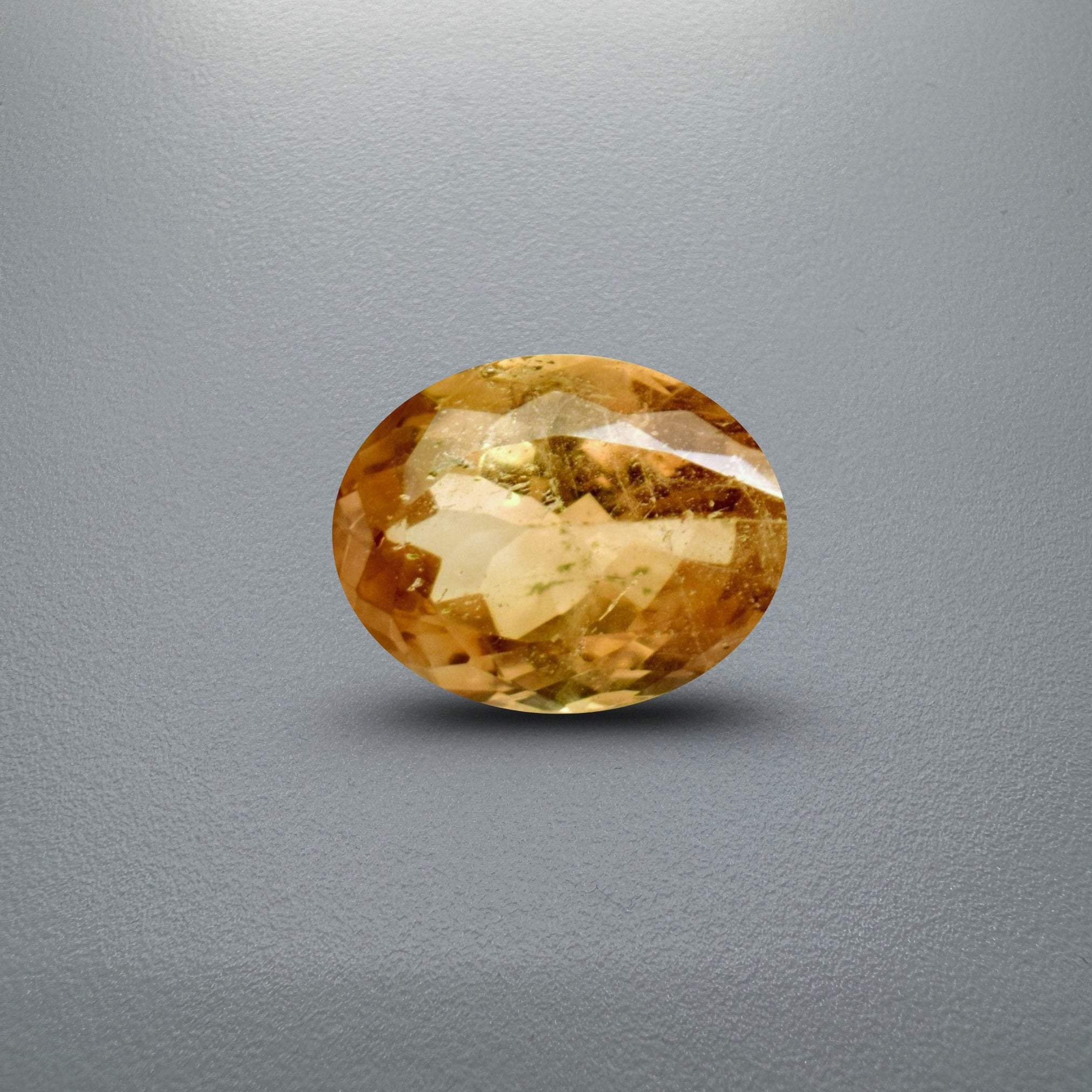 Natural Amber Topaz Stone 12.50 Carats  12.7x7.5mm in Oval Shape